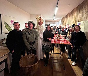 Gruppenbild einiger WIGE-Mitglieder bei der Nikolausfeier 2025